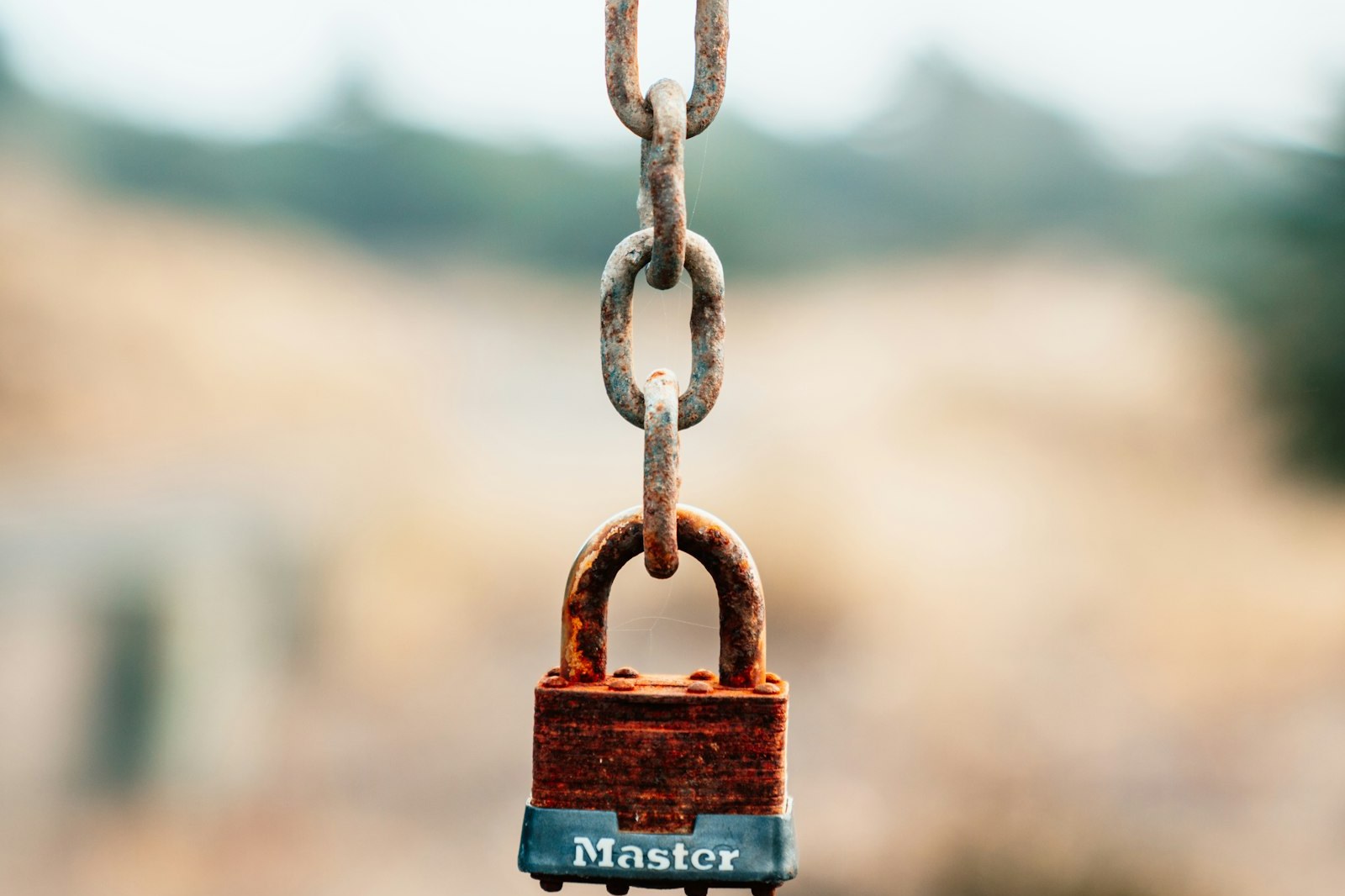 A rusty padlock and chain